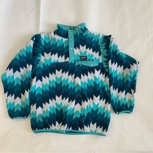 Patagonia Sweater is 14 XL girls . But it fits a women’s size S